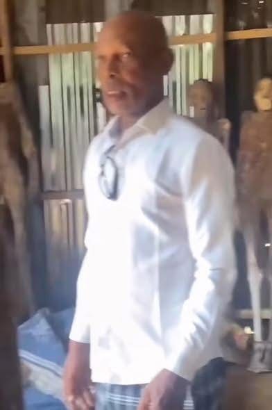 Video of A Nigerian man who was caught with ddead bodies